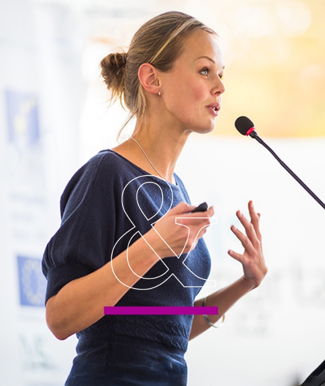 women speaking on mic